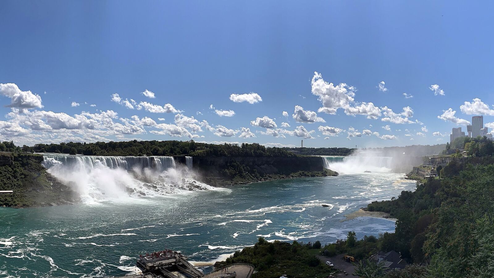 The Horseshoe and American Falls on the Niagara River, with the Niagara Falls, Ontario skyline